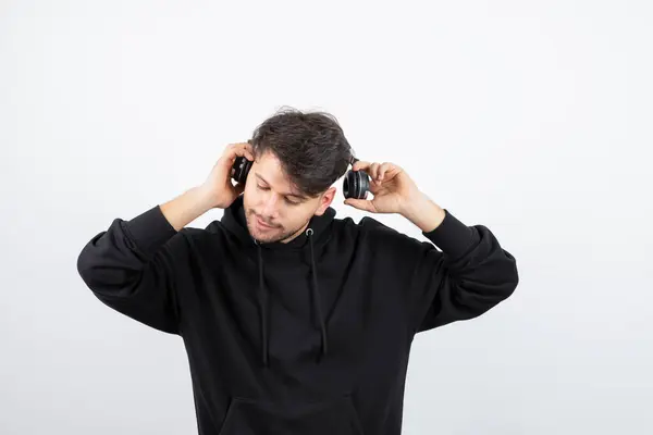 Handsome Young Man Black Hoodie Wearing Big Wireless Music Headphones — Stock Photo, Image