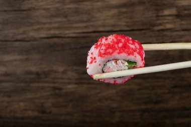  Philadelphia tek kullanımlık tahta çubuklarda yuvarlanıyor. Yüksek kalite fotoğraf