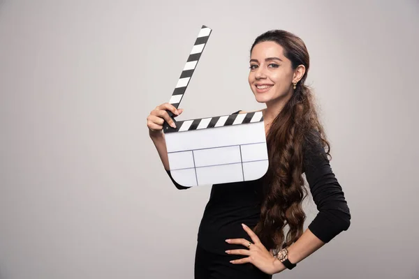 Filmmaker Girl Holding Open Blank Clapper Board Looking Positive High — Stock Photo, Image