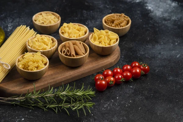 Pasta Varieties Wooden Cups Served Cherry Tomatoes Rosemary Leaves High — Stock Photo, Image