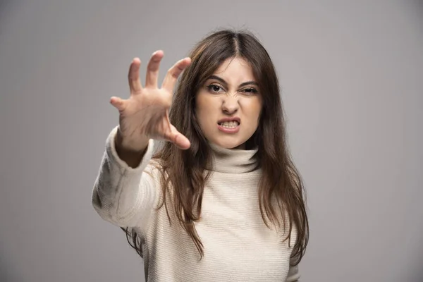 Young Woman Sweater Standing Showing Claws High Quality Photo — Stock Photo, Image
