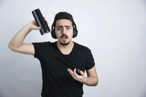 Brunette Man Model Headphones Holding Empty Cup High Quality Photo — Stock Photo, Image