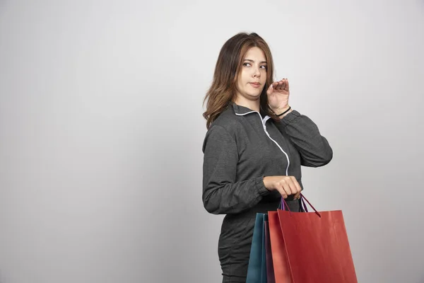 Photo Young Woman Holding Shopping Bags High Quality Photo — Stock Photo, Image