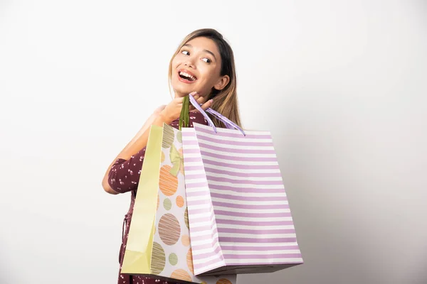 Young Woman Holding Shop Bags White Background High Quality Photo — Stock Photo, Image