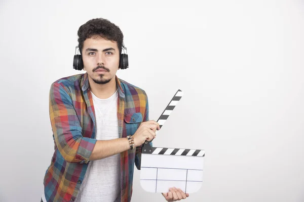 Filmmaker Holding Clapper Board Wearing Headphones High Quality Photo — Stock Photo, Image