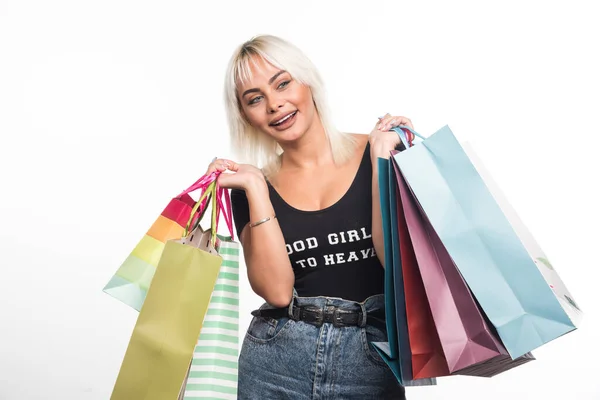 Jovem Feliz Segurando Sacos Compras Fundo Branco Foto Alta Qualidade — Fotografia de Stock