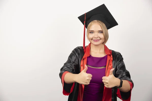 Female Student Gown Smiling While Making Thumbs White Background High — Stock Photo, Image