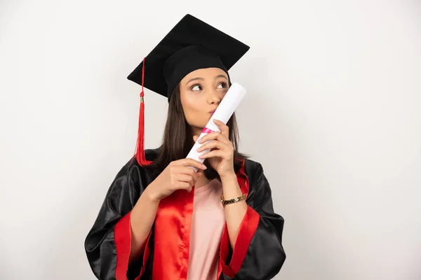 Fresh Graduate Kissing Her Diploma White Background High Quality Photo — Stock Photo, Image