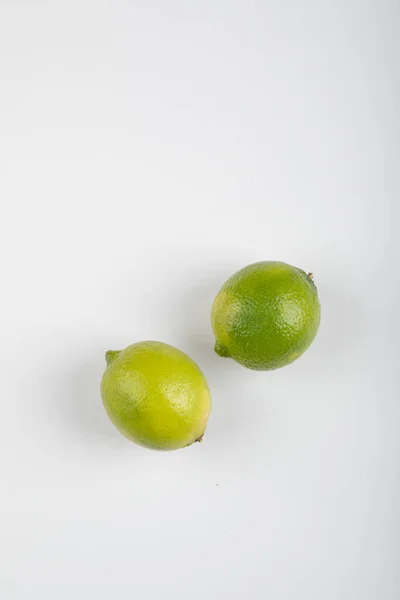 Two Ripe Lime Fruits Isolated White Background High Quality Photo — Stock Photo, Image