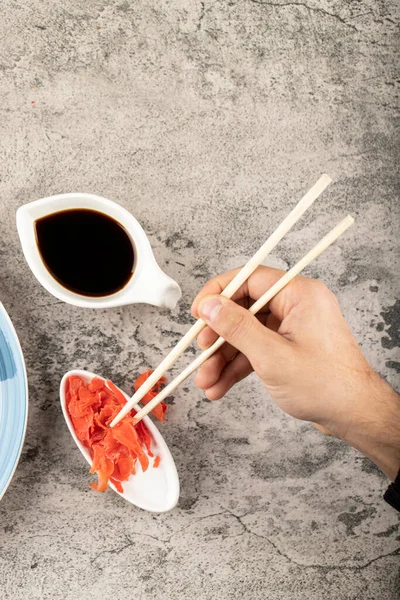 Hand Picking Pickled Ginger Chopsticks White Plate High Quality Photo — Stock Photo, Image