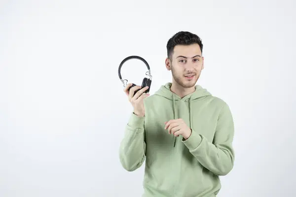 Smiling Handsome Man Holding Headphones White Wall High Quality Photo — Stock Photo, Image