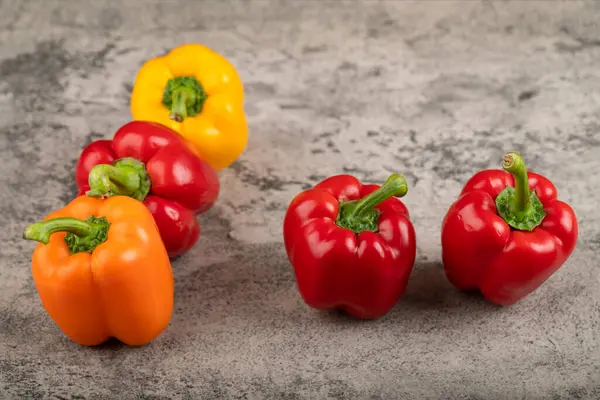 Bunch Colorful Sweet Bell Peppers Stone Background High Quality Photo — Stock Photo, Image