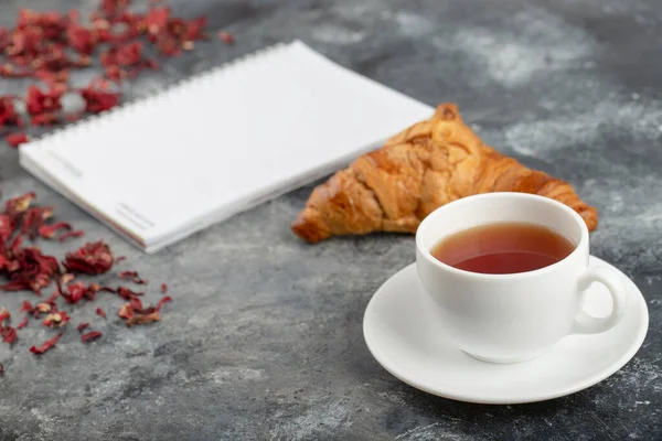 Opened Notebook Cup Tea Plain Croissant Placed Stone Table High — Photo