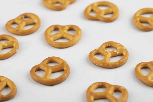 Pile Delicious Salted Dry Pretzels Scattered White Background High Quality — Stock Photo, Image