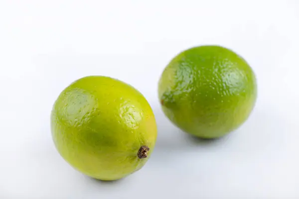 Two Whole Fresh Limes Isolated White Background High Quality Photo — Stock Photo, Image