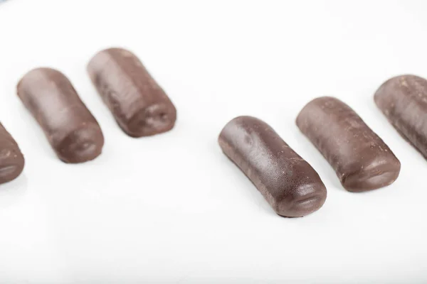 Conjunto Paus Chocolate Colocados Sobre Fundo Branco Foto Alta Qualidade — Fotografia de Stock