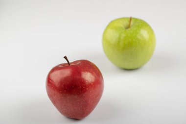 Fresh ripe red and green apples on white background. High quality photo