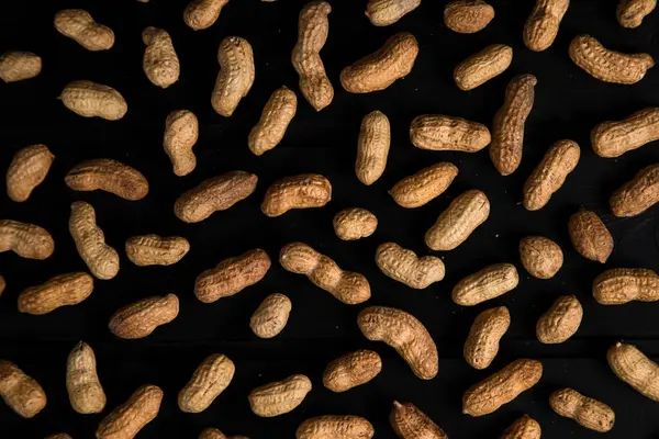 Sani Snack Noccioline Arachidi Poste Tavolo Legno Scuro Foto Alta — Foto Stock