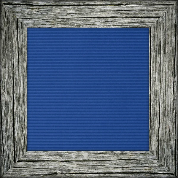 Marco viejo con lienzo azul — Foto de Stock