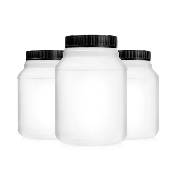 Three plastic jars isolated — Stock Photo, Image
