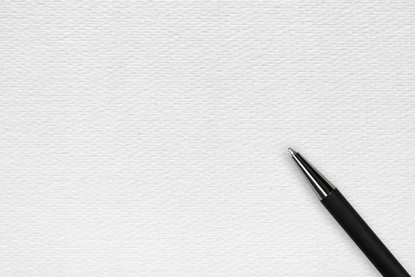 Black ball pen on the white paper background — Stock Photo, Image