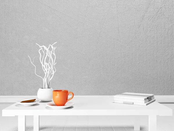 En kopp, en vas och böcker på vita bordet — Stockfoto