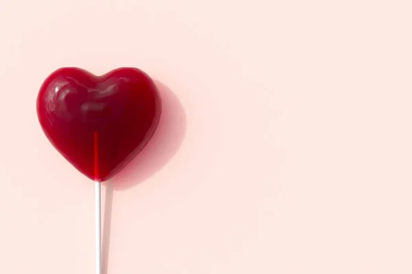Red Heart Shape Pirulito Candy Fundo Rosa Para Espaço Cópia — Fotografia de Stock