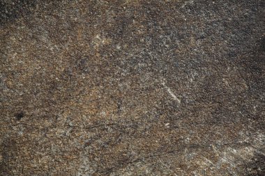 Doğal taşın dokusu yakından çekilmiş. Porselen taş ve seramik üretimi için arka plan. Stok fotoğrafçılığı