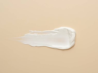 Bej arka planda beyaz krem dokusu