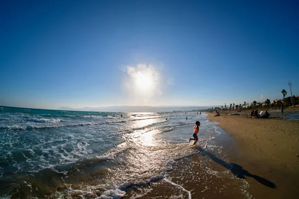 Unrecognizable Boy Inflatable Armbands Runs Out Sea Sandy Beach Fish — Stock Photo, Image