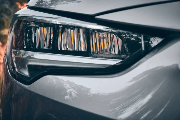 Faróis de LED de carro moderno de perto — Fotografia de Stock