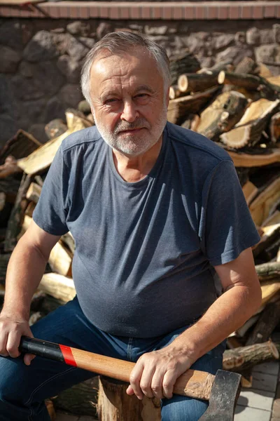 Elderly Man Beard Shirt Jeans Sits Yard Front Pile Firewood — Stock Photo, Image