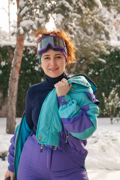 Beautiful Young Woman Ski Goggles Overalls Stands Backdrop Tall Trees — Stock Photo, Image