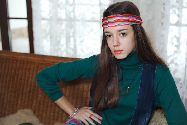 Beautiful young teenage girl hippie posing in room — Stock Photo, Image