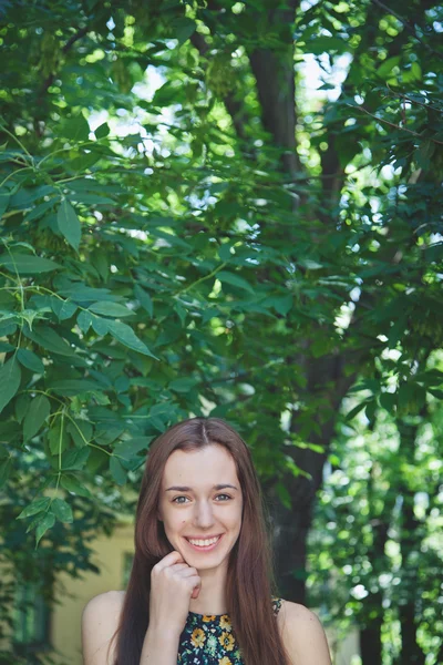 Young beautiful teen girl in summer park — Stock Photo, Image