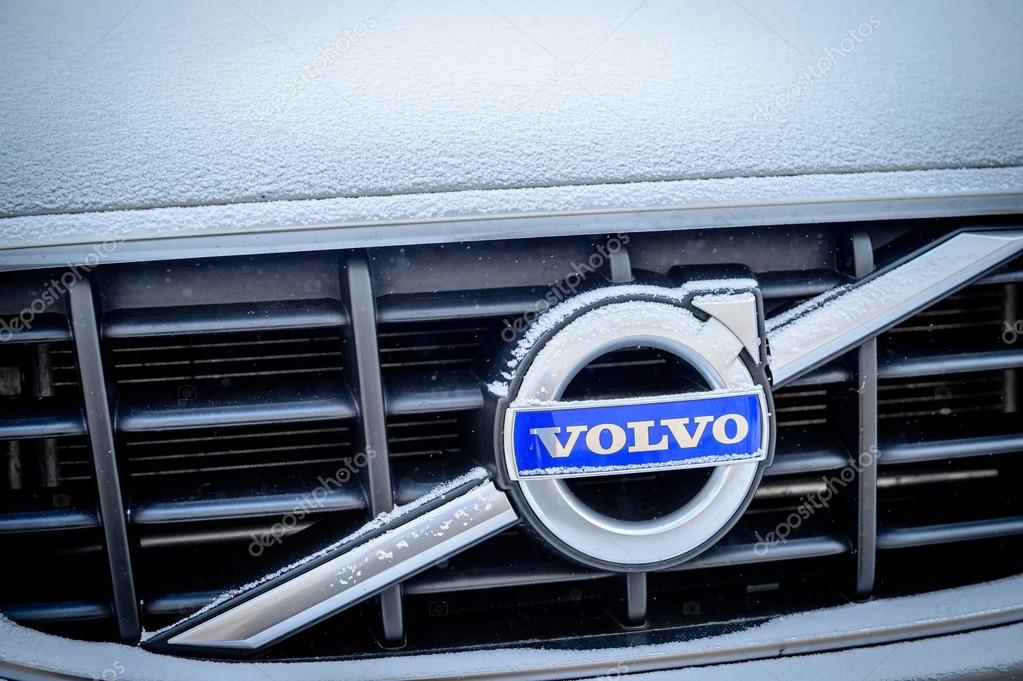 PARIS, FRANCE - JAN 20, 2016: Volvo Cars logotype covered with snow flakeson car front. Volvo is the only car maker that thas the biggest 5 star NCAP test results