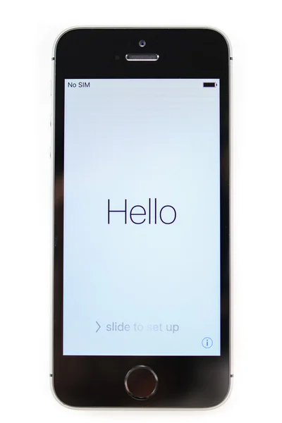 Unboxing и первый запуск нового iPhone SE — стоковое фото