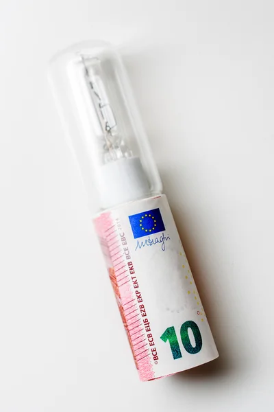 10 Ten Euro tube shape in light bulb — Stock Photo, Image