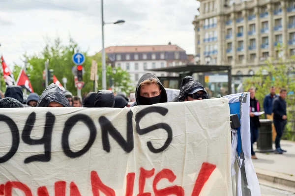 Grouop with covered face during protest — Stock Photo, Image