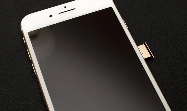 IPhone 7 Plus podwójny aparat Unboxing dodaje się tykuły moduł karty SIM — Zdjęcie stockowe