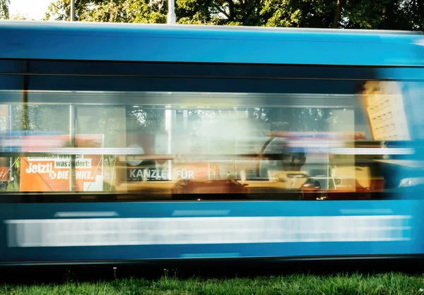 Efocused tramway motion with large election posters with the chancellor candidates of SPD with Olaf Scholz — Stock Photo, Image