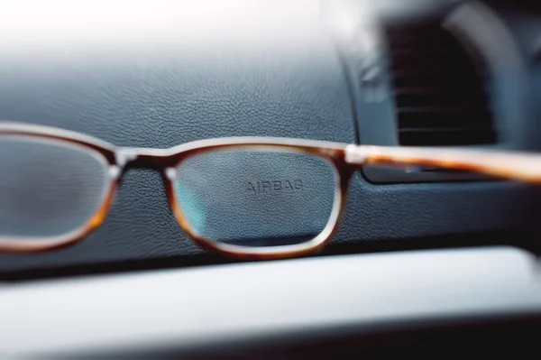 Airbag sign through eyewear glasses — Stock Photo, Image