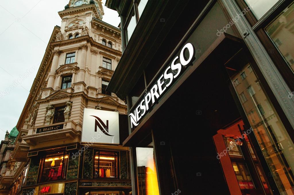 VIENNA, AUSTRIA - JULY 47, 2011: Close-up of the Nespresso logo on the frontage of the Nespresso store at the Graben shopping street in Vienna, Austria. Nespresso is the brand name of Nestlé Nespresso S.A., an operating unit of the Nestlé Group, base