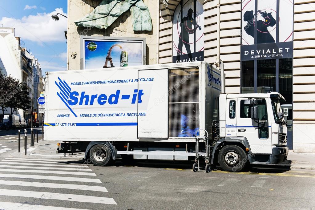 Shredit truck working on shredding and confidential waste dispo