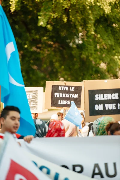 Działaczy na rzecz praw człowieka ujgurski protestu — Zdjęcie stockowe