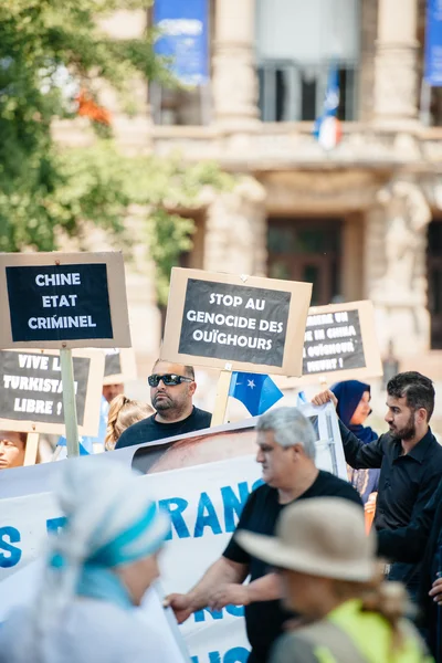 Уйгурские правозащитники протестуют — стоковое фото