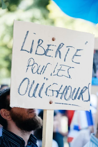 Uigurische Menschenrechtsaktivisten protestieren — Stockfoto