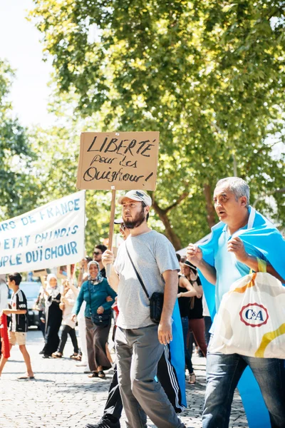 Uigurische Menschenrechtsaktivisten protestieren — Stockfoto