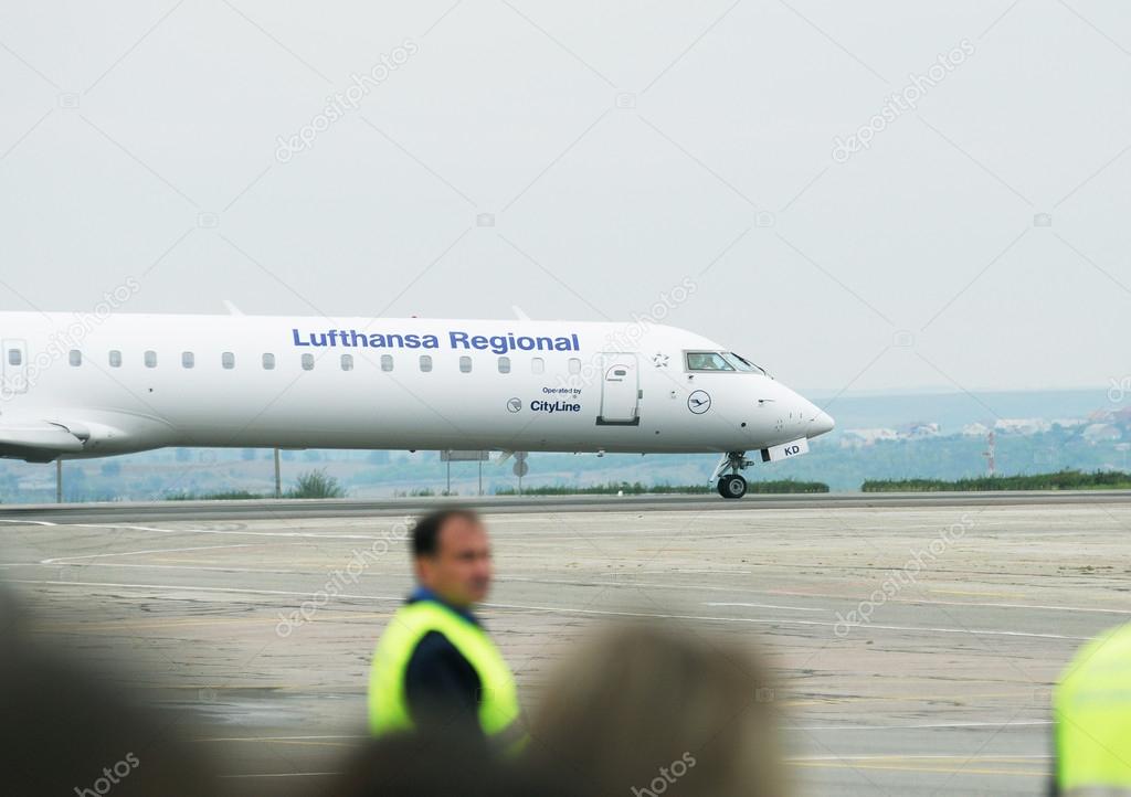 FRANKFURT AM MAIN, GERMANY - CIRCA 2010 - Bombardier CRJ700 series from Lufthansa Regional plane in Frankfurt Airport. Lufthansa Regional is an alliance and brand name of regional airlines within the German Lufthansa Group.