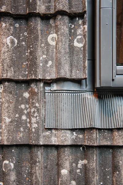 Water thermal insulation of a roof tile demonstration next ot a